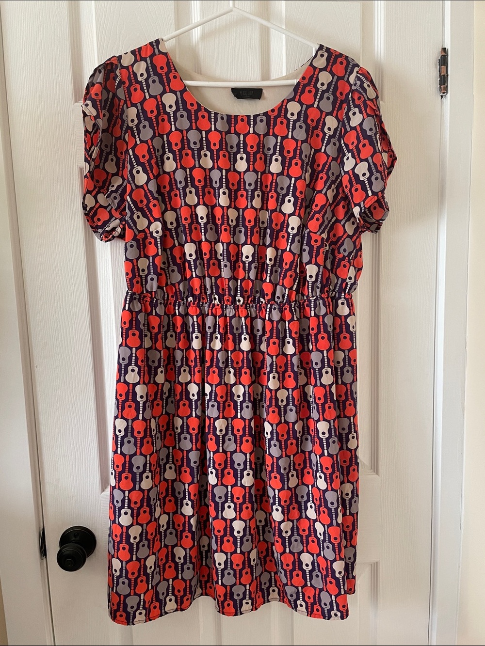 Peach love ModCloth purple
Orange guitar print dress